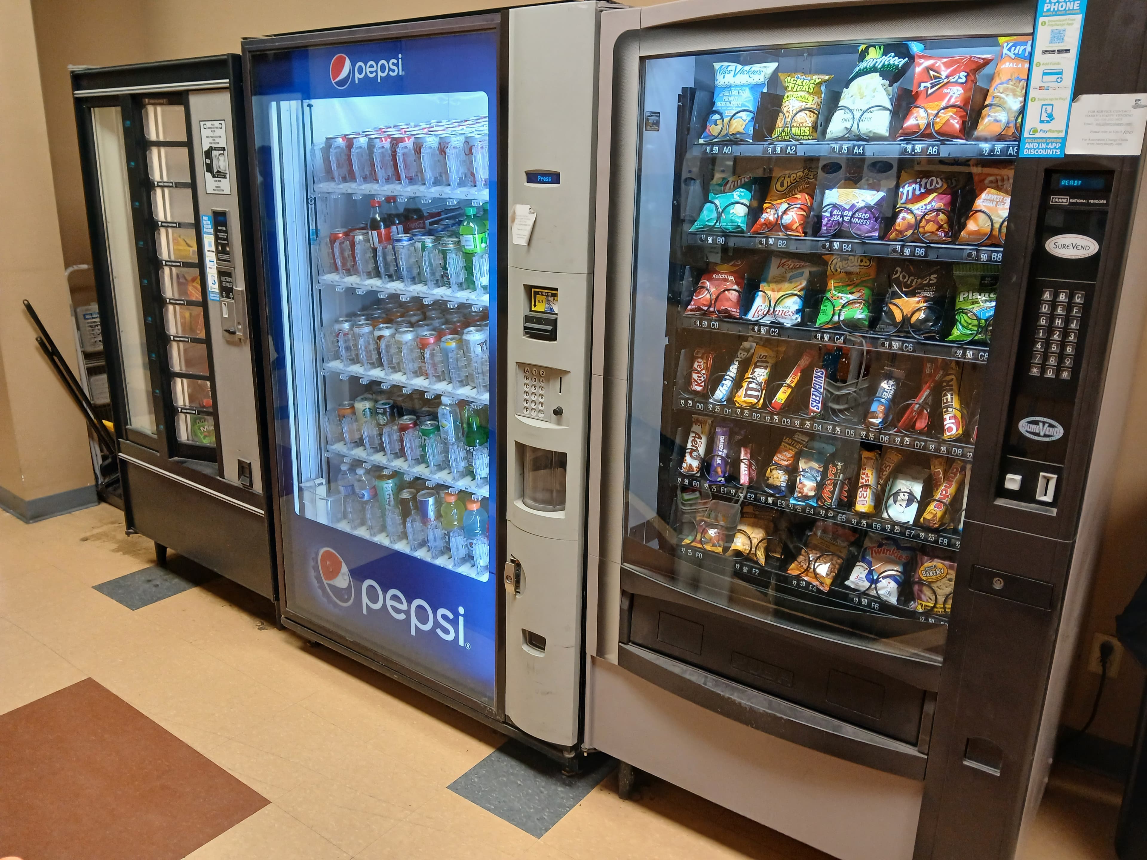 Snack and Pepsi beverage vending machines installed together in a Harry's Happy Vending client break room